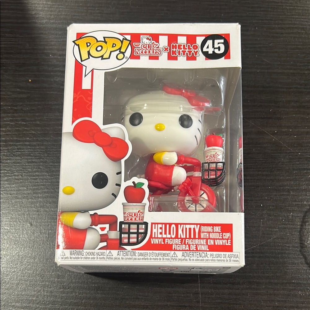 Hello Kitty Riding Bike Vinyl Figure